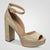 A single women's platform sandal with a high block heel, featuring a textured metallic gold glitter finish and an ankle strap with a buckle, shown on a light gray background.