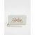 A white faux leather zip-around wallet with a wristlet strap, featuring a prominent gold metallic 'Bebe' script logo on the front, set against a plain white background.
