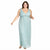 A woman modeling a sleeveless, floor-length light blue-green dress with a V-neckline, gathered waist detail, and a textured, pleated appearance against a plain white background.