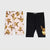 A two-piece kids' shorts set featuring a light pink pair with an all-over Eevee print and a solid black pair with a single Eevee graphic on the lower left leg, displayed on a light gray background.