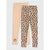 Two pairs of children's leggings laid flat on a light gray background. The front pair has a beige and brown leopard print pattern, and the back pair is solid light beige with a small black paw print near the hem.
