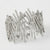 A wide silver-toned cuff bracelet embellished with multiple rows of clear rhinestones, photographed on a clean white background.