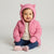 Sinsay Baby Girl Pink Hooded Puffer Jacket With Full Zip And Wavy Quilted Pattern.