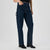 A model wearing dark blue straight-leg denim jeans with a distinctive black metal ring detail on the side pocket, paired with black ankle boots against a light gray studio background.