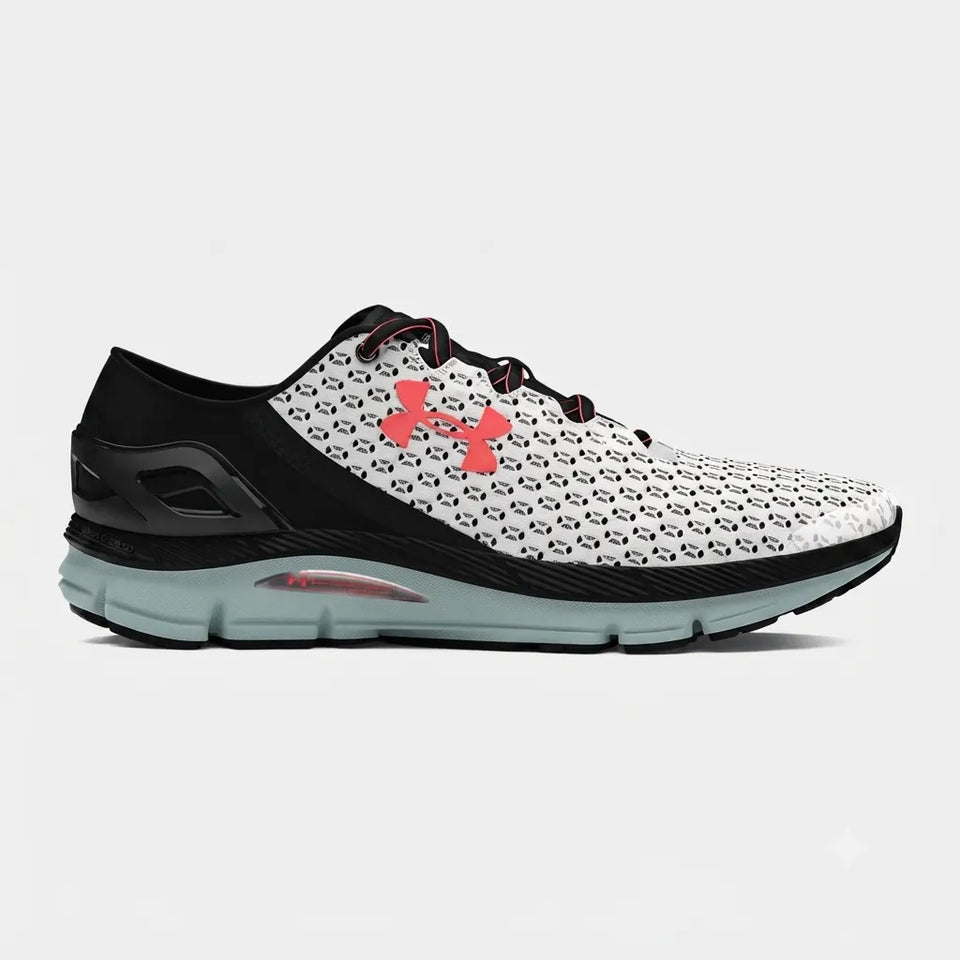 A single Under Armour running shoe shown in profile against a light gray background. The shoe features a white and black patterned knit upper, a black collar and heel, a translucent pink Under Armour logo on the side, and a light gray and black sole.