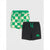 A pair of children's shorts from Batman featuring a green and cream checkerboard pattern with Batman logos on the front, and a solid black pair with a green drawstring and Batman logo patch.