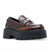 A dark brown leather penny loafer with a chunky black platform sole and a small gold-tone metal emblem on the strap, shown against a plain white background.