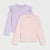 Two girls' long-sleeve tops layered together on a light gray background. The top in back is light lavender with ruffled shoulders, and the top in front is light pink with a small scattered floral print.