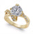 A yellow gold engagement ring featuring a large round brilliant-cut clear center stone, accented by small pavé-set clear stones along the curved shoulders and a split shank, shown on a white background.