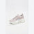 A single chunky sneaker in a pale pink and white colorway, shown from a three-quarters angle against a clean white studio background.