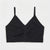 A black ribbed knit camisole crop top with thin shoulder straps and a gathered ruched center front, displayed flat against a light gray background.