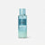 Victoria's Secret Coastal Blooms Hair Oil in a clear bottle showing a light blue gradient liquid, with a matching light blue cap, on a light gray background.