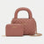 A dusty rose quilted handbag with a top handle and a matching zip-around wallet, both featuring gold-tone 'bebe' branding and a gold chain strap, set against a light gray background.
