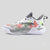 A white and gray basketball sneaker with colorful graffiti-style red, green, and pink paint splatters, shown from a side profile on a light gray background.