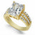 A yellow gold ring featuring a large cushion-cut clear gemstone in a prong setting, with three rows of small clear stones along the band, shown on a white background.