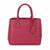 A pink faux-leather handbag with a polka-dot pattern, featuring dual top handles, a hanging leather tag, and gold-tone hardware, shown against a plain white background.