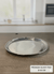 Silver tray on a kitchen counter with a blurred background