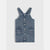 A toddler's denim overall-style top with adjustable shoulder straps, a snap-button front, and two front patch pockets, shown flat against a light gray background.