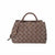 A brown woven leather handbag with top handles and a shoulder strap, shown against a plain white background.