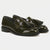 A pair of glossy dark olive green patent leather tassel loafers with black soles, displayed on a clean white background.