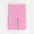 Pink ribbed biker shorts with a wide waistband, laid flat on a light gray background.