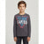 A young boy modeling a dark gray long-sleeve t-shirt with a colorful graphic print on the front that reads 'CLASSIC AMERICAN CALIFORNIA GUESS STYLE 1991'.