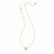 A delicate gold chain necklace featuring a small flower-shaped pendant with white inlay, displayed on a clean white background.