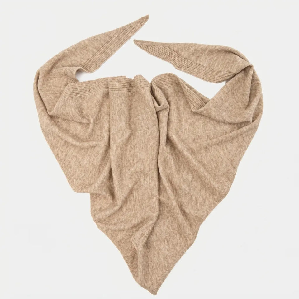 A light beige knit scarf or bandana, styled in a triangular drape with two pointed ends, shown against a plain light gray background.