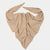 A light beige knit scarf or bandana, styled in a triangular drape with two pointed ends, shown against a plain light gray background.
