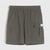 A pair of olive green cargo shorts with an elastic waistband, featuring two large side cargo pockets and a small white brand label on the right pocket, shown against a light gray background.
