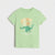 A light green short-sleeve kids' t-shirt featuring a teal green long-necked dinosaur graphic and the text 'NOTHING TO WORRY ABOUT' in orange and white, displayed on a light gray background.