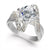 A silver engagement ring featuring a large round brilliant-cut center stone in a prong setting, with curved pavé-set accent stones along the shoulders, shown on a clean white background.