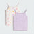 Two girls' camisole tank tops by babytodd, shown flat against a light gray background. The top on the left is off-white with pastel pink, yellow, and blue star prints.