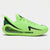 A Nike basketball sneaker in neon green with black accents, featuring a textured knit upper, a large black Swoosh, and a thick cushioned sole with a visible air unit.