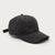 A black baseball cap with a subtle tonal geometric dot pattern, shown from a three-quarters angle on a light gray background.
