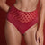 A close-up of a model wearing high-waisted red underwear with a sheer polka-dot mesh panel at the waistband, set against a solid red background.