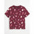 A short-sleeve crewneck t-shirt in burgundy with an all-over candy print, laid flat against a light gray background.