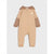A baby hooded one-piece jumpsuit in beige and brown, featuring a small teddy bear graphic on the chest, displayed against a light gray background.