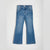 A pair of medium-wash blue denim jeans with a flared bootcut silhouette, laid flat against a light gray background.