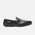 Green sandal with unique sole design on a white background