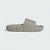 Beige slide sandal with brand logo on a white background