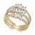 A gold multi-band ring featuring baguette and round clear gemstones, set against a plain white background.