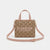 A beige and brown monogram handbag with pink handles and strap, featuring gold hardware and the text 'bebe los angeles' printed on the front, set against a light gray background.