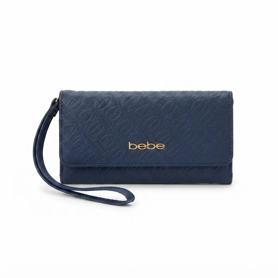 A navy blue textured clutch wallet with a matching wristlet strap and gold 'bebe' logo on the front, set against a plain white background.