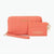 A coral pink quilted wallet and matching card holder set by Bebe Los Angeles, featuring gold-tone logo lettering and keychain rings, set against a plain white background.