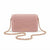 A pink woven leather crossbody bag with a gold-tone chain strap and a gold 'bebe' logo on the front, displayed on a clean white background.