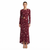 A woman modeling a long-sleeve, floor-length burgundy dress with a white floral pattern and a twisted front detail, set against a plain white background.
