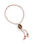 Pink braided bracelet with a round charm featuring a horse design on a white background