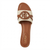 A single Lauren Ralph Lauren slide sandal shown from a top-down view on a white background. The sandal features a tan leather footbed and straps, a beige canvas upper band, and a tan leather circular logo patch with 'RL' monogram in the center.