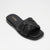 A black Aldo slide sandal with a quilted woven strap, shown from a three-quarters angle on a light gray background.